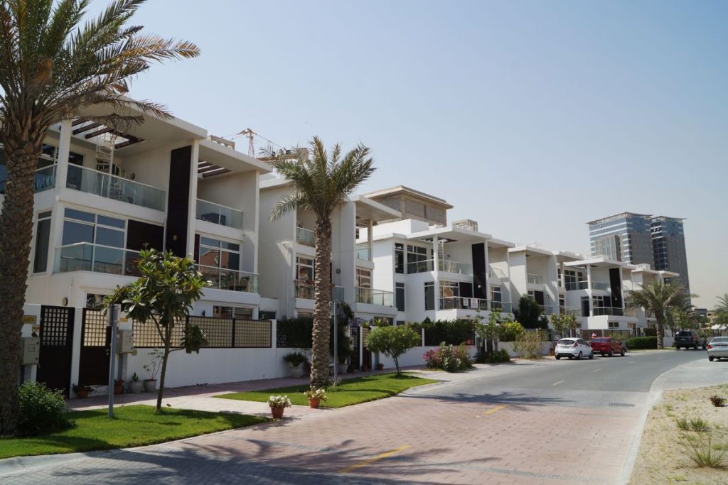 Different types of accommodation in Dubai including apartments, villas, and serviced residences